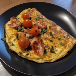 Omelette tomate-lardon