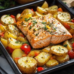 Salmón al horno con patatas y verduras